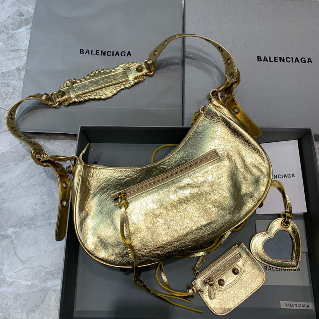 Balenciaga 67130723 Frauen Le Cagole kleine Umhängetaschen Arena Lambskin in Gold