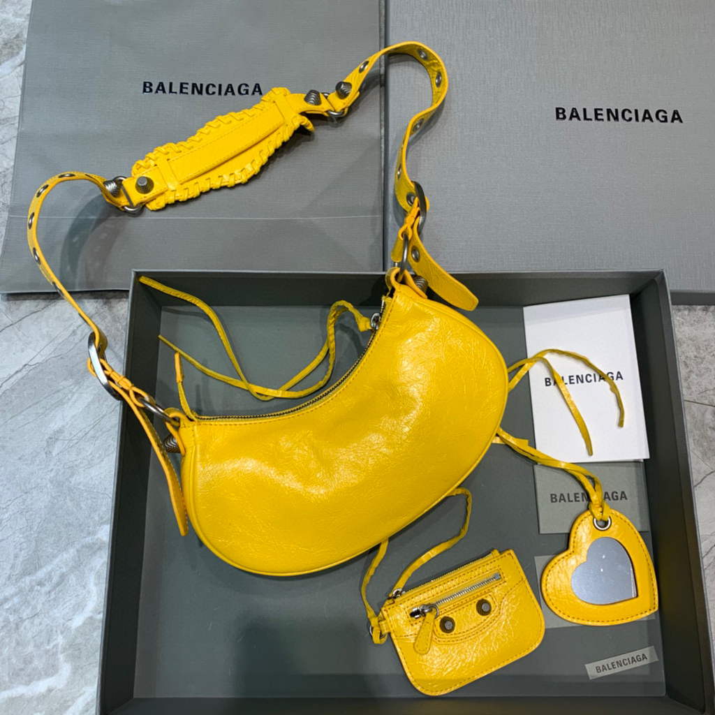 Balenciaga 700940210 Frauen Neo Cagole XS Handtasche in der gelben Arena Lambskin